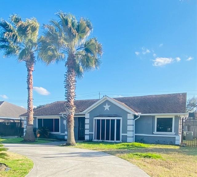 ranch-style house with a front yard