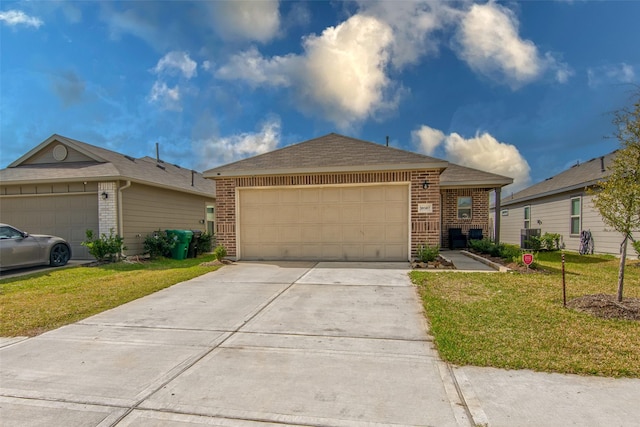 ranch-style home with a garage and a front yard