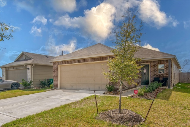 ranch-style home with a garage and a front lawn