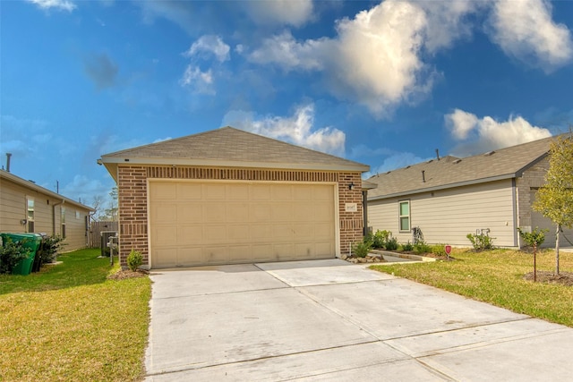 ranch-style home featuring a garage and a front yard