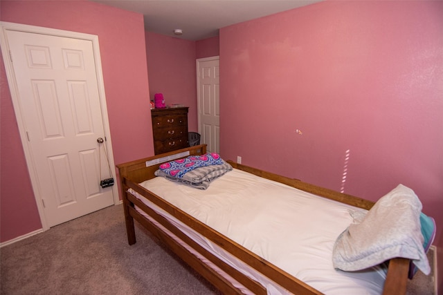 bedroom featuring carpet