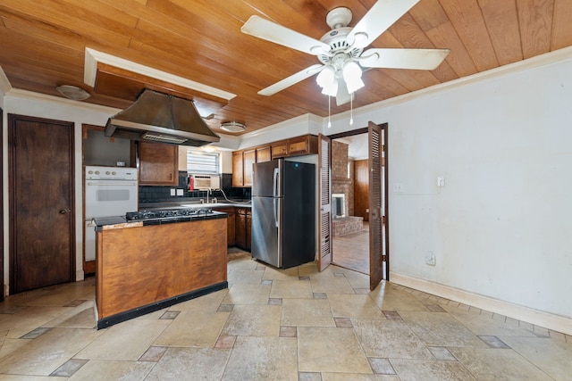 kitchen with crown molding, wood ceiling, exhaust hood, and appliances with stainless steel finishes