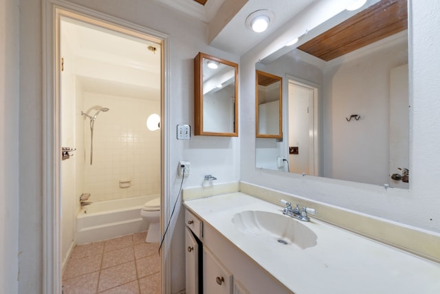 full bathroom featuring tile patterned floors, vanity, toilet, and tiled shower / bath combo