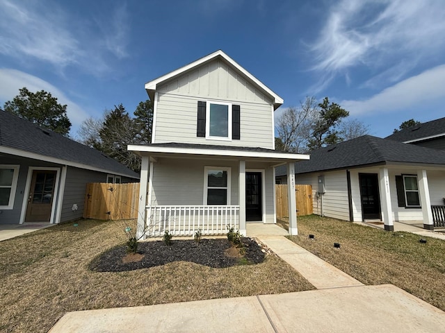 view of front of home featuring a porch and a front yard