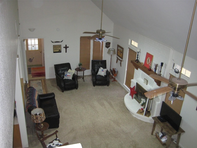 living room featuring ceiling fan, high vaulted ceiling, and carpet floors