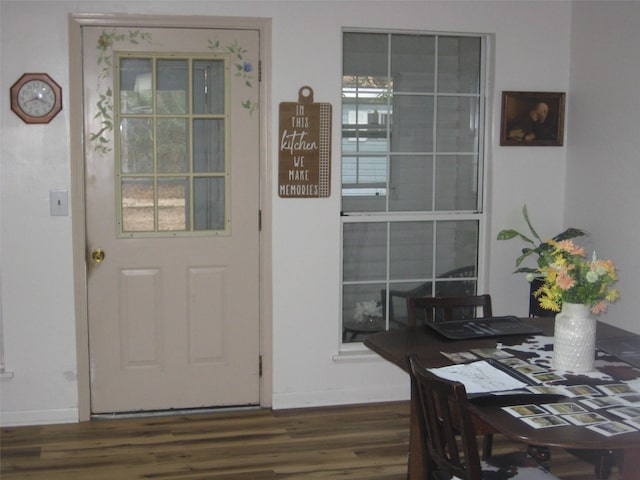 interior space with dark hardwood / wood-style flooring