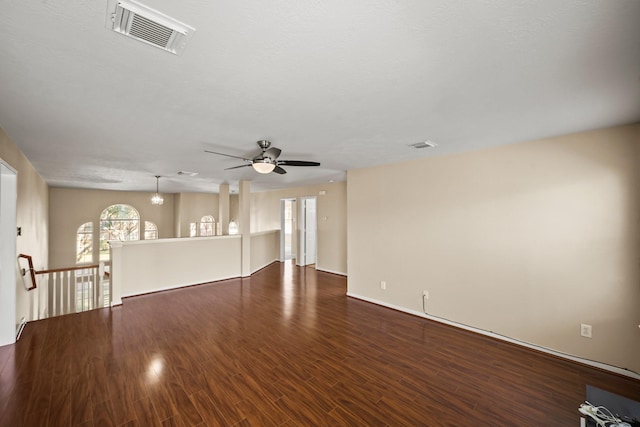 unfurnished room featuring hardwood / wood-style floors and ceiling fan