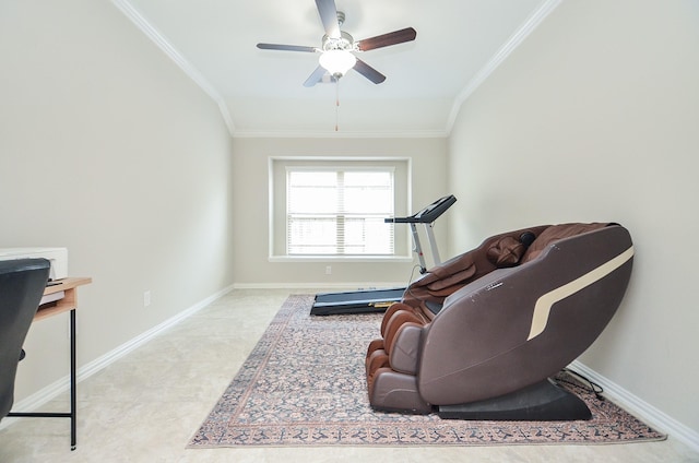 sitting room with crown molding, vaulted ceiling, and ceiling fan