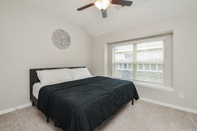 carpeted bedroom with lofted ceiling and ceiling fan