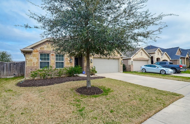 view of front facade with a garage and a front yard