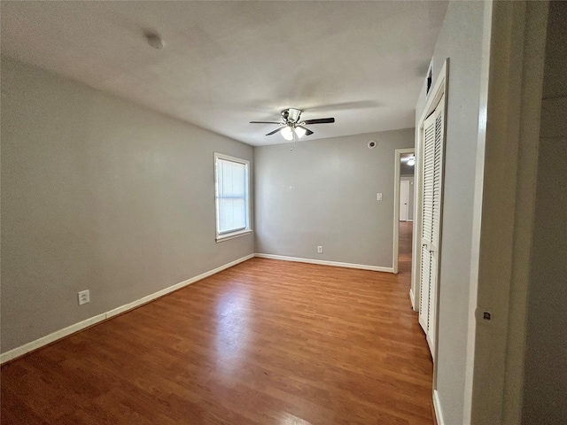 spare room featuring ceiling fan and light wood-type flooring