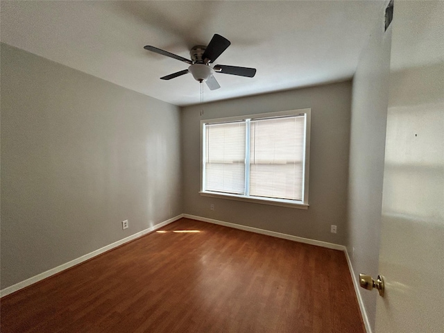 unfurnished room with hardwood / wood-style floors and ceiling fan