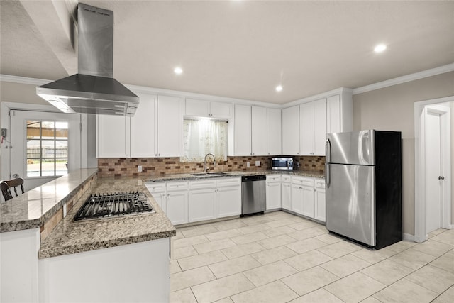 kitchen with sink, kitchen peninsula, island exhaust hood, stainless steel appliances, and white cabinets