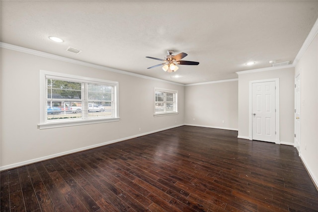 empty room featuring dark wood-type flooring, ornamental molding, and ceiling fan