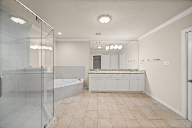 bathroom featuring crown molding, vanity, and plus walk in shower