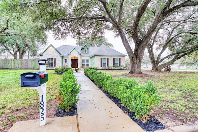 view of front of house with a front lawn