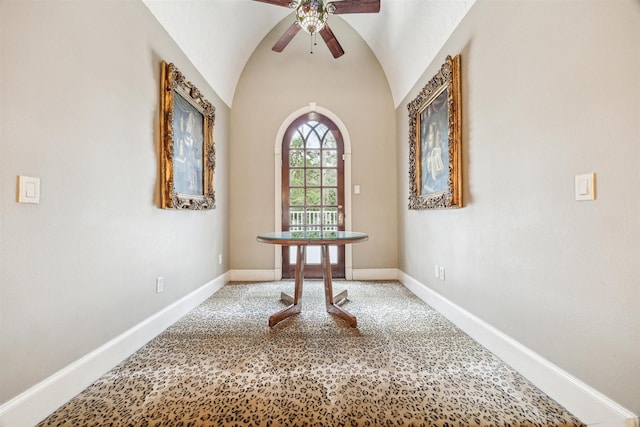 corridor featuring vaulted ceiling