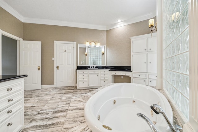 bathroom featuring crown molding, vanity, and tiled tub