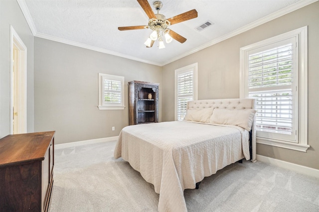 bedroom with multiple windows, crown molding, and light carpet