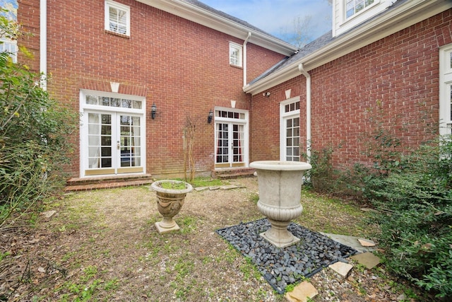 back of property with french doors