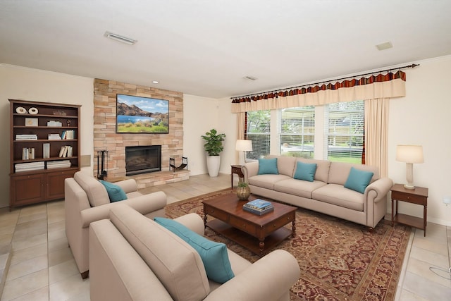 19431 Joanleigh Dr, Spring, TX 77388 - living room with crown molding, light tile patterned flooring, visible vents, and a fireplace