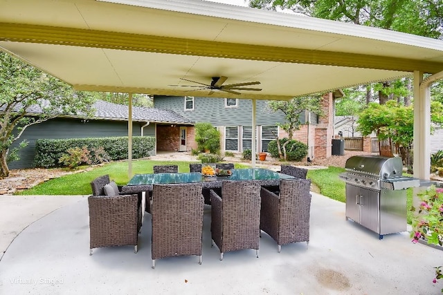 19431 Joanleigh Dr, Spring, TX 77388 - view of patio featuring fence, outdoor dining space, ceiling fan, and a grill