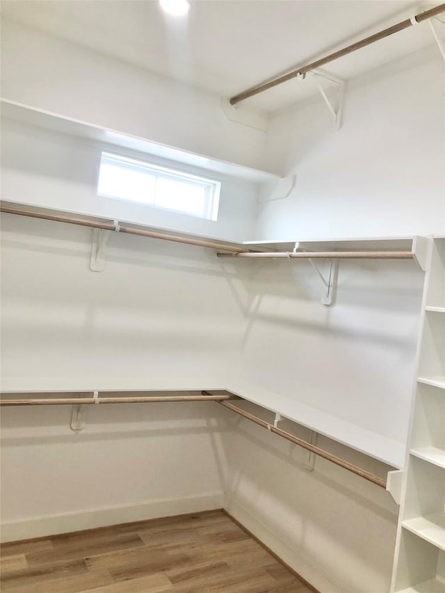 2215 Bevis St, Houston, TX 77008 - walk in closet featuring wood finished floors