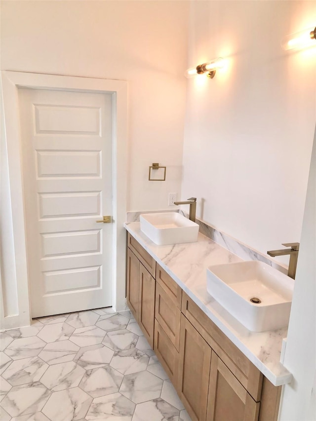 2215 Bevis St, Houston, TX 77008 - bathroom with double vanity and marble finish floors