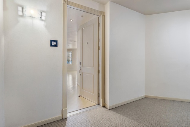 505 Jackson Hill St S Unit 108, Houston, TX 77007 - hallway with carpet floors and baseboards