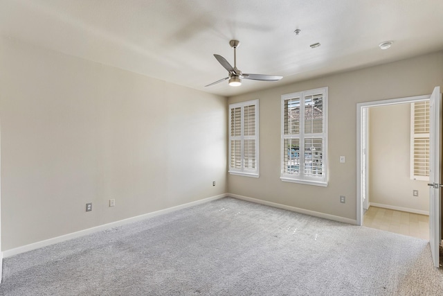 505 Jackson Hill St S Unit 108, Houston, TX 77007 - unfurnished room featuring a ceiling fan, light carpet, baseboards, and a smoke detector