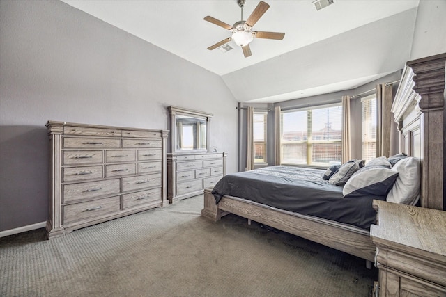 bedroom featuring baseboards, visible vents, a ceiling fan, lofted ceiling, and carpet floors