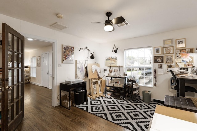 office space featuring dark hardwood / wood-style floors and ceiling fan