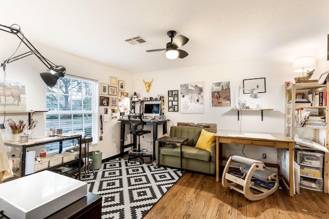 office space with hardwood / wood-style flooring and ceiling fan