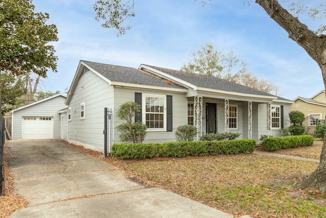 ranch-style home featuring a garage and covered porch