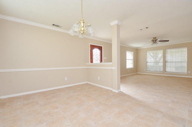 spare room with crown molding, ceiling fan with notable chandelier, and decorative columns