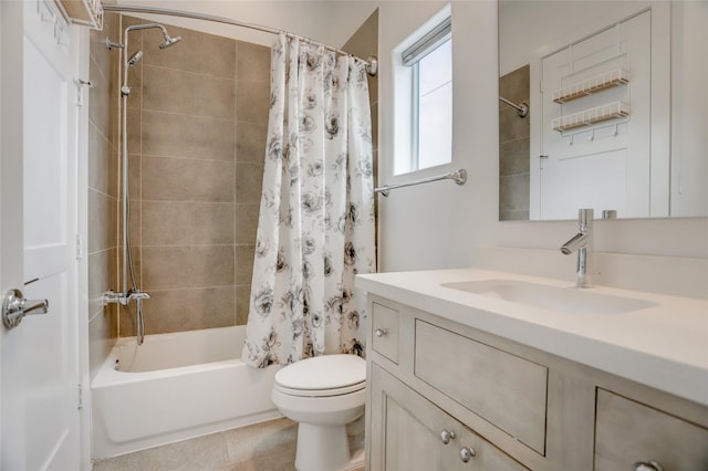 bathroom with shower / bath combo, tile patterned flooring, vanity, and toilet