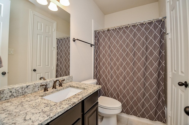 bathroom featuring tile patterned flooring, vanity, a shower with curtain, and toilet