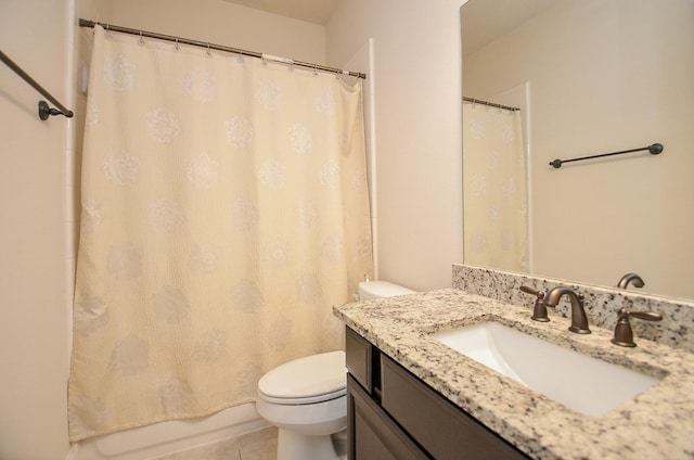 full bathroom featuring vanity, shower / bath combination with curtain, and toilet