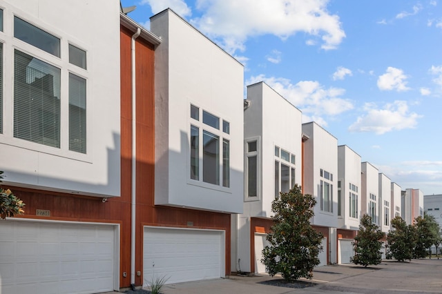 view of building exterior featuring a garage