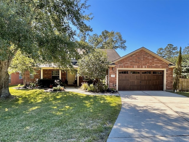 view of front facade featuring a garage and a front yard