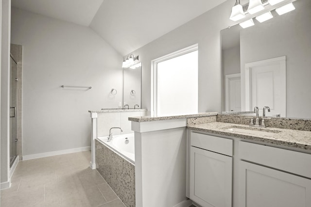 bathroom with vanity, tile patterned flooring, vaulted ceiling, and plus walk in shower