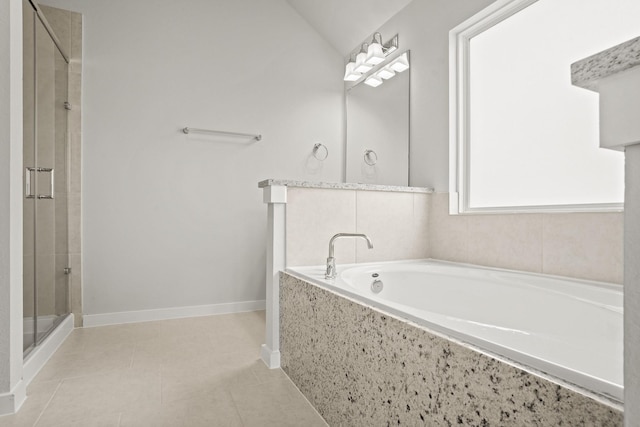 bathroom featuring lofted ceiling, tile patterned floors, and plus walk in shower