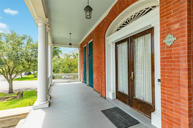 1428 Ball, Galveston, TX 77550 - view of patio with covered porch and french doors