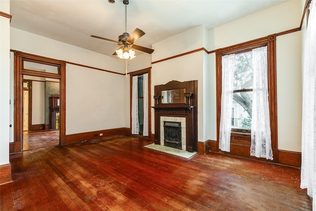1428 Ball, Galveston, TX 77550 - unfurnished living room with hardwood / wood-style flooring, a fireplace with flush hearth, and ceiling fan