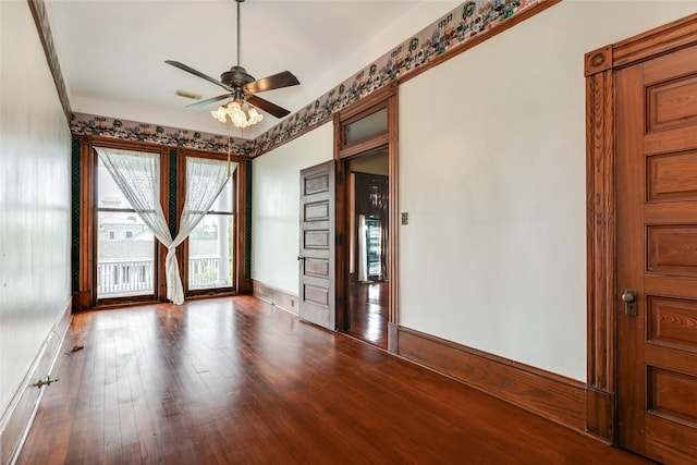 1428 Ball, Galveston, TX 77550 - spare room with ceiling fan, wood finished floors, and baseboards