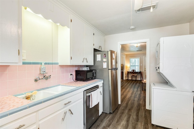 1428 Ball, Galveston, TX 77550 - kitchen with stainless steel appliances, dark wood-style floors, light countertops, and a sink