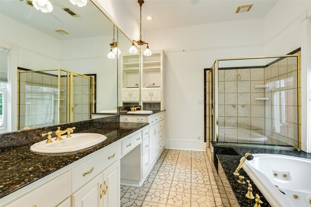 1428 Ball, Galveston, TX 77550 - bathroom with a stall shower, a tub with jets, vanity, and baseboards