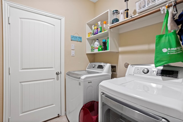 laundry area featuring laundry area and independent washer and dryer