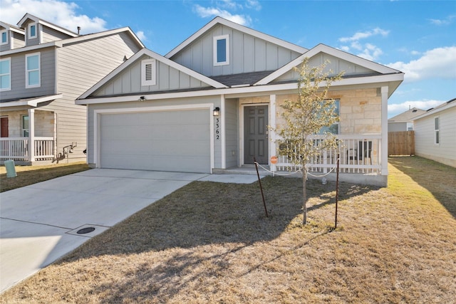 view of front of home with a garage and covered porch