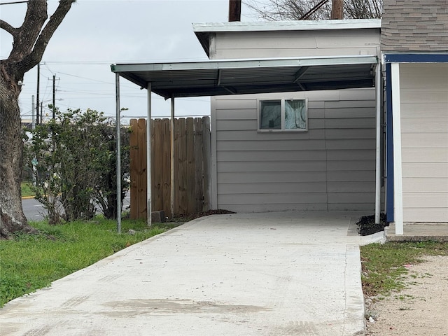 exterior space featuring a carport